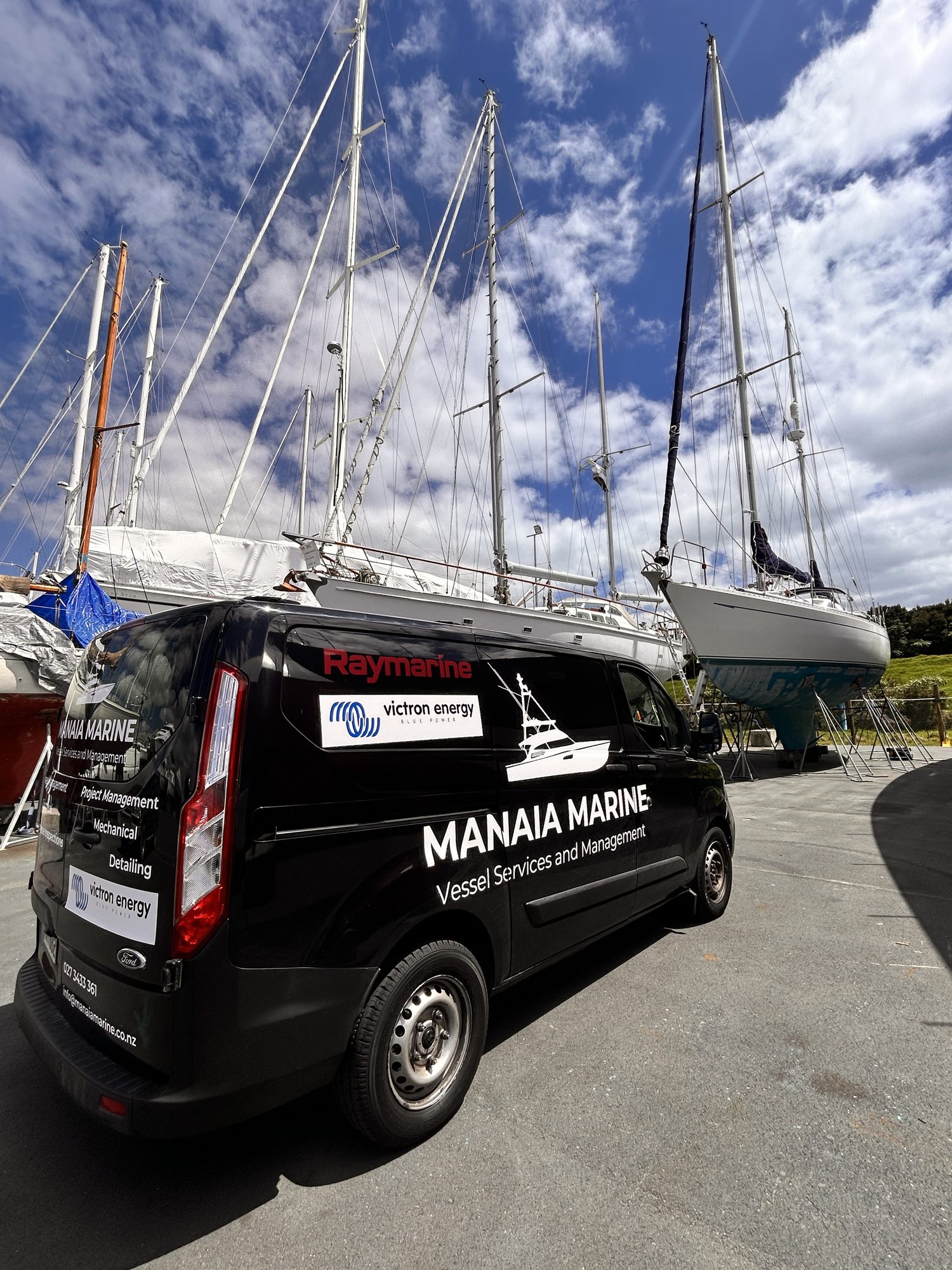 Manaia Marine service vehicle in a Northland boatyard, with Raymarine and Victron Energy decals